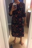 I really love this dress but I definitely should have ordered a small. After reading a bunch of reviews that it's tighter around the chest area, I decided to go with a medium, but it is swimming on me! I considered returning it for a small but I think the small may even be too big. I am going to get it altered but in the meantime, belting it works just fine! Wore it the other day and loved it! First pic is dress naturally falling on me, second pic is me pulling the extra material of the dress back to see how it'd look in a smaller, more fitted size. - Jerrica S.
