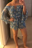 This is such a fun romper! Materially is super flowy, and I love the colors! The off the shoulder is also snug so it doesn't fall down or slide up! But it does runs tad small, and could be a little short for tall people. But if you are petite like me this is the romper for you! - Melanie P.