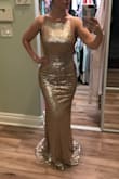So excited to wear this dress in a couple weeks! Always wanted to wear a gold sparkly dress and this one is perfect! The sparkle is somewhat muted which I love so I don't feel like a gold disco ball. Love that it hugs the curves. A tad long even with heels but I'm short so that's expected, I will get it altered. - Justine S.