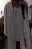The dress fit perfectly. It was nice, comfortable and length was good. I have ordered from Lulus many times and it was never a disappointment. Whenever I had a problem they quickly replied. - MahinaHouLani P.