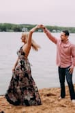 I bought this dress for engagement pictures. It perfect for a casual look and can also be dressed up. At first I had a hard time figuring out the straps in the back because it was difficult to figure out the placement, but after the first try I never had a problem. The fabric is very comfortable. It's light, but not see through or cheap fabric. My fiance loved it and wants me to wear it again! - Kelsey S.