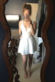 This dress is adorable, and actually really comfortable too! It's not too long or too short, and the fabric is really comfortable. The dip in the front doesn't feel too revealing. And the wiring in the front still keeps everything "in place", since you can't wear a bra with this. - Michelle F.