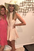 Amazing fit! And I'm 6.5 feet tall and it was surprisingly long enough, wore it with heels and spandex underneath and didn't have any problems. Wish it came in different colors because it kind of washed me out but otherwise it was perfect!! definitely recommend. - Caiti W.