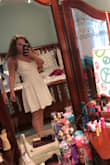 Fits well-the straps are adjustable so I was able to pull it up to show less cleavage. Nice pattern as an overlay. Not perfectly form fitting in the waist but close enough. - Brianna M.