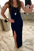 I wore this dress to a friend's rehearsal dinner and I was worried it would be perceived as "too sexy"- It's very form fitting, the slit is true to wear it sits on the model, and it hugs the booty! Surprisingly, the majority of the many compliments I received on this dress that night were from parents- whew. I'd give it 5 stars if i could but it was SO long. I'm short, but I was also wearing 3-3.5 inch stilettos and it was still on the ground and I kept stepping on it! If I hiked it up higher (benefit of the elastic waist), the slit was way too high though haha. BUT super adorable dress. It was incredibly comfortable and I love that i could wear it on a beach vacation or even to a wedding with the right jewelry and shoes ;) Personally, I was worried the $40 price tag wouldn't be worth it, but it was even if I have to pay a little bit to have it hemmed (I usually have to anyways with my height!). If it wasn't $40 and needed a hem though I'd probably buy it in 2 more colors!!! - Alissa C.