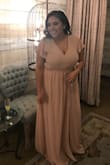 I had to have the top altered to cover my chest area. It was way to open and big. But the dress is nice and overall everything else I loved. - Vivian Q.