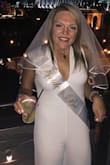 I ordered this for my bachelorette trip to Nashville. Read the reviews and went with an XL just to be safe. Glad I did, it fit perfectly. It's very long so had to wear super tall wedges BC didn't have time to get it hemmed! So glad I ordered this! - Anna R.