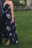 This dress fit perfectly and I am in love with it! It is a little confusing to figure out the ties but other than that I loved it! - Taylor N.