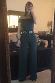 Obsessed with this. I bought one in black (size M) before I got the green. The black was a little big so I ordered the green in a small. FITS amazing. I wore it this weekend to a bridal shower and I cannot even tell you how many compliments I got. I want this jumpsuit in every color. So comfortable! - Britnee M.
