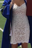 I ordered this dress in both a small & medium for my college graduation. I am tall & have a large chest so sometimes I need a larger size just to fit my chest. This was the case in this dress so I am glad I ordered both sizes. I am a 34 D and could not zip the small up all the way past my boobs. The medium was a little looser in the waist but fit me much better up top so if you have a larger chest you may want to consider sizing up. The straps are adjustable which was great and the length was perfect. Unlike other white dresses I have tried on, this dress is lined so is not see through AT ALL. This is the perfect white lace dress for summer events. - Allie H.