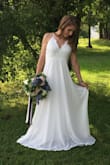 This dress is dreamy! I'm a photographer, ordered this dress for a styled wedding shoot, and wish I could wear it. It was perfect shoot with this dress. Flowy, elegant, romantic. It's the perfect beach wedding or garden wedding gown and would be great for a formal rehearsal or reception as well. Brides to be.... do yourself a favor. Just buy this dress. You will love it! (picture is a bts from my phone) - Shayna J.