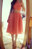 I like this outfit because it looks so put together, while being minimal effort! The color is more orange coral than the very pink coral of the pictures. It can also be dressed up (I wear a large collar type necklace) or even dressed down (I wear the skirt with a different top, maybe a denim vest). - V. R.
