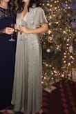 The color is slightly more muted than the photos. I got so many compliments on this dress and felt like a goddess. - Madison M.