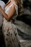 I wore this dress for my engagement photos. I absolutely love this dress. It's elegant & unique. I did have to get it hemmed by a tailor though, because even with 2.5 inch heels it was too long. I can't wait to wear it again! - Alexis S.