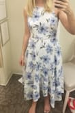 Its very beautiful and feminine. I got it for my rehearsal dinner next week but I was able to wear it to 2 graduations so far and it's very appropriate. Dressy casual. It is tight around the bust and waist and is more forgiving around the lower tummy area. 
The reason I didn't give it 5 stars is because the price and the wrinkles. It wrinkles so much! - Kristen T.