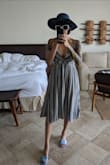 This dress moves. It was big in the chest for me, but tied tight enough it worked.

The stripes in blue black brown and white is tres chic. - Shoko R.