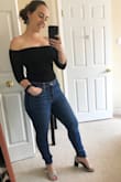 I absolutely love this top - it fits true to size and the band around the top stops it from slipping down. Looks adorable tucked into jeans or a high waisted skirt! - Jamie G.