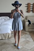 This dress exceeded my expectations. Packed it up for vacation and came out with zero wrinkles. The material is soft and fully lined, very good quality. Shirt dresses bring a bit of class and this blue one is chic too. No complaints. - Shoko R.