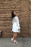 Elegant white lace detailing. Loved the sleeves and the cuffs were the perfect size. - Jordyn A.