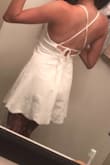 I wore this for my college graduation. It's super comfy, light, and fun! I like the adjustable straps and detail and the bottom. However, it was a little tight. I decided to keep the XS but I think a small would've been more comfortable. - Kaitlin G.