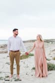 I wore this dress for my engagement photos and absolutely loved it! It's very flattering and fits true to size. The flowy material looked beautiful blowing in the wind on the beach. I can't wait to wear this dress again! - Nicole L.