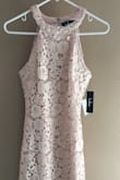 It's just as beautiful as in the picture, if not more! Well crafted and stunning!  Perfect mid thigh length for my height. I will feel comfortable dancing, sitting and moving around in this dress! - Angela S.