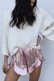 Adore this sweater! It fits super well, and while being a loose fit and cozy, it looks SO CUTE. The wide fit and shorter cut is so flattering. Love wearing it with shorts in the summer. - Tita S.