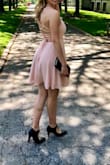 I bought this in blush for a spring wedding. The flouncy skirt and cut of the dress was cute and made the dress day-appropriate, while the ties in the back made it sexy and transitioned over to the nighttime dancing. I got a ton of compliments, and the dress felt comfortable and very well made. I am going to keep it as a staple for future events. - Nicole P.