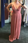 I love the dress! It was very tight in the rib cage but thankfully could zip it up.
I'm 5'7" and had to hem a couple of inches, it was really long (in photo I'm in flip-flops). - Grace W.