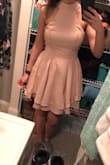 I ordered this dress for the color and because I loved the two layered skirt. And when it came in, the skirt was my favorite part! I wanted so badly to like this dress, but the top fit awkwardly at my neck like there was too much fabric at the chest and just didn't look great on my body. If you are taller/have a longer torso, this would probably be a great fit. - Nicole P.