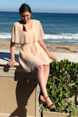This dress is my favorite. I can wear it to work events and always receive compliments. It is very flattering on my figure as it helps the appearance of hips and an hourglass shape. - Brittany P.