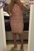 I originally ordered this in an XS but had to return, the size small was a great fit, however, if you're like me and tend to be a little more bottom heavy this may not be very comfortable.  It was a little tight around my bottom and thighs. Very beautiful dress, with a nice soft lace material.  The color is a bit more pink than the online photo but it's a gorgeous color for springtime.  One star knocked off because of the awkward stitching in the waistline.  The slip part of the dress underneath the lace was sewn together at the waistline area and creates what looks to be a wrinkle in the waistline, as if the bottom slip portion was scrunched underneath the lace.  It just looks a little weird but it's not a deal breaker for me.  Also, there is no stretch to this dress so. - Brittany M.