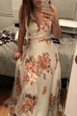 I LOVE this dress. It's exactly what I was looking for for my bridal shower (and for the days when I'm feeling a little extra) This dress runs very long, so be prepared to rock it with heels. Also, it absolutely floats when you move. My friends call it my goddess dress ;) - Rachel K.