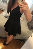 I ordered this in both black and white and I LOVE this dress. It has a tighter lining inside so you don't have to worry about catching a breeze and flashing everyone, and its really thick and tight at the top so you don't need to wear a bra!! - Rachel K.