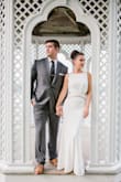 I got married in this dress on the beach in Bar Harbor, Maine! It was perfect for what I was looking for. I didn't want to spend a lot of money and I didn't want a heavy wedding dress, but was still able to achieve that timeless classy look. I added a crystal belt for a little sparkle which finished the look for our private ceremony. It was very long so I had to have it hemmed (story of my life!), but otherwise it fit perfectly. It was extremely comfortable and hugged the right spots and it bunched up in the most flattering way. - Kayla S.