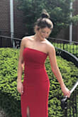 Bought this for a black tie wedding in May. Ordered a size Medium and it fit perfectly! I can't even tell you how many compliments I received because everyone loved it! The dress was perfect the entire night. I am a 34D, and I can see how you would go down a size if you have a super small chest. There is a clear grippy thing at the top of the dress so it stayed up the entire night (i always get nervous buying strapless since I do have a larger chest and I was worried i would have to keep pulling it up the entire night. I also ordered this in a Large and it was way too big for me (fell down right when I put it on). I normally wear a S/M in tops, size 4/5 in shorts. The dress was also the perfect length. Went down to my heels. - Kimberly L.
