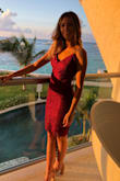 I absolutely love this dress! Wore it on my honeymoon and got so many compliments. It is a little snug on the hips but not enough that I'd want to size up. Detail in the back is EVERYTHING! - Kristiana L.