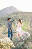 Wore this dress for an engagement photo session and LOVED IT. Super comfortable and beautiful. Fits true to size and even lots of adjust-ability within the dress since it's a wrap and the straps adjust too. LOVE IT!

Photo credit to the amazing Betsy and John Photography based out of Tucson, AZ. (But they travel!!) - Bonnie M.