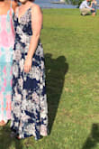 I ordered a medium and was a little tight around the waist but the length and top was perfect! Loved the print! - Allison T.