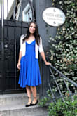 This dress was almost perfect, the style is cute and I love how flowy it is, perfect for summer nights out. I agree with other commentators that the blue is much more of a bright blue than a denim blue. I'm not huge on super bright colors, so I wish that it was a bit more a muted blue like in the photo, but not a deal breaker. Also this dress wrinkles like CRAZY, so if you are traveling with it, plan on doing a decent amount of ironing/steaming. - Lisa B.