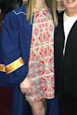 It hangs just right. It's tight enough but still loose flowing. I wore it for baccalaureate at school. It can be dressed up or down. I'm in love with it. My sisters already tried to steal it. - Alison V.