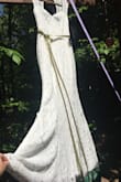 This is my daughter's wedding dress! It's a great weight, flows and moves well. Some amount of stretch makes it hug the curves. - Jill K.