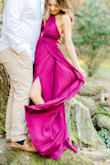 I'm short, so I'm used to maxi dresses being too long. This one was no different! It was also a little big up top, luckily the straps can be pulled as loose or as tight as you need them. Overall it was a beautiful dress and worked perfectly for my engagement pictures!

** side note** This dress is TRUE to color, my pictures make it appear bright fuchsia when its actually burgundy. My photographer's edit makes everything appear brighter/ - Karlie N.