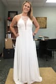 I have a short waist and wanted to love a low-back dress so much but they just don't look right on me. This dress surprised me so much. I absolutely love it!! It's slimming and feminine with just a touch of flare. - Caroline S.