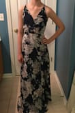 This dress fit my daughter without an ounce of wiggle room in the waist. Very long, she needed a little heel even at her height to keep from dragging. Beautiful dress, she got lots of compliments. - Samara G.