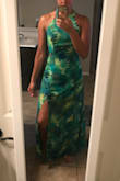Love this dress! You can dress it up or down with heels or flats. Great light weight material with a beautiful design that is elegant and sexy! Looks like the picture. My husband loves it! Can't wait to wear it in Costa Rica! - Jessica D.