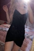 It ran a little tight but still fit great. The material was nice and light and soft. It looked great on and I wore it to a fundraiser. It's a very pretty dress to wear out. - Grace S.