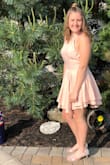 After shopping with my 14 yr old and not finding anything she liked in the store, I went online and found this dress. She immediately loved it so I ordered it! The dress fit great except there was no padding so I brought to my seamstress and had cups put in! Then it was a perfect fit!! Material is beautiful, made very well....well worth the money! She said she got so many compliments! We are so so satisfied with this dress!! - Jacqueline P.
