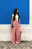 Wore this with a white crop top on vacation to Puerto Rico. It is perfect although just a tad bit loose around the waist in the medium ( I am usually between small and medium). I am 5'10 so I was afraid the small might be too short. The length was perfect . Down side is that it wrinkles easily and it's hand wash only. - Alice C.