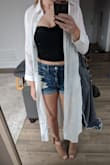 This is a great piece and can easily be styled over a swimsuit or worn with jeans. It packed really well in my suitcase (didn't wrinkle) and the fabric is super soft and breathable. - Leah M.